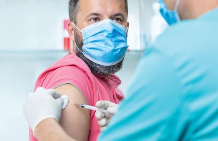 Man receiving a vaccine