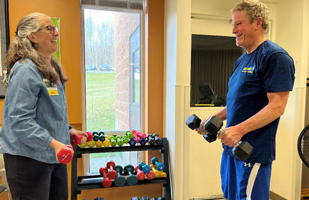 Cardiac Rehabilitation nurse Wendy Hubbard with former patient David Shropshire in MAHHC Rehabilitation Center.