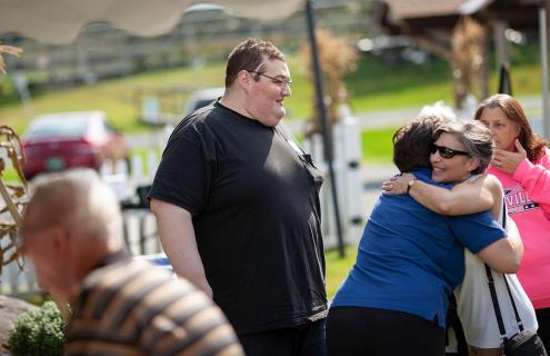 Former Rehabilitation Center patients and family gather for a reunion