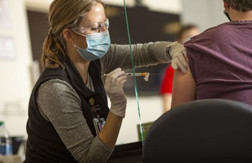 Nurse giving vaccination
