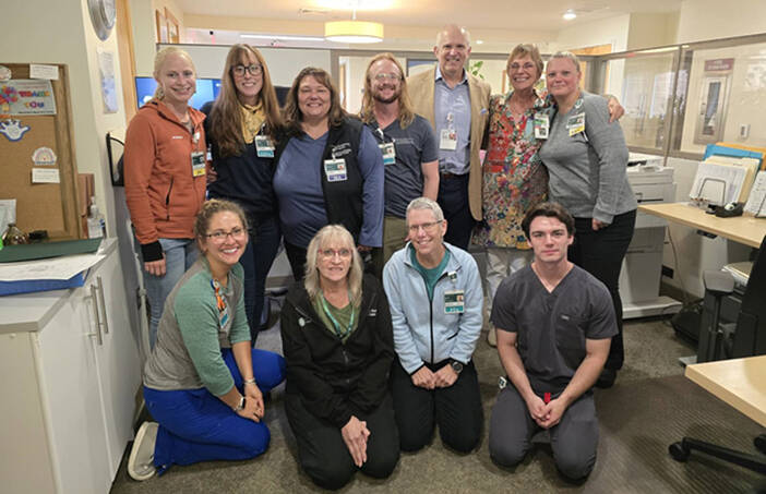group photo of Mt. Ascutney Hospital staff with September employee of the month Cara Goodenough